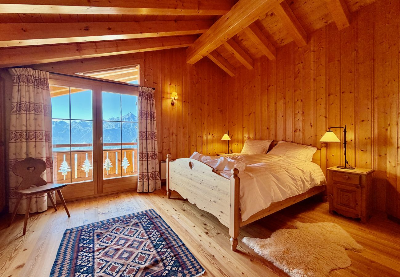 Chambre à coucher Chalet Chèvre d'Or à Veysonnaz en Suisse  